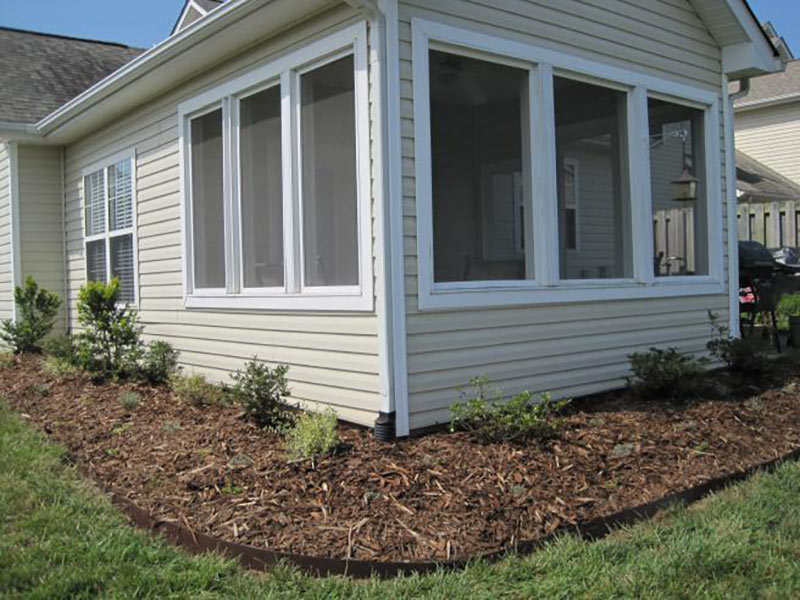 Photo of landscaped yard around house